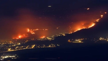 Forest fires blaze in north Israel after rockets launched from Le